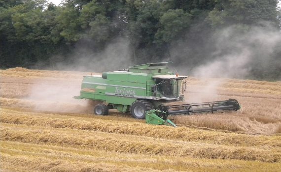 combine harvester in action during arable and tillage tours from agritours ireland.